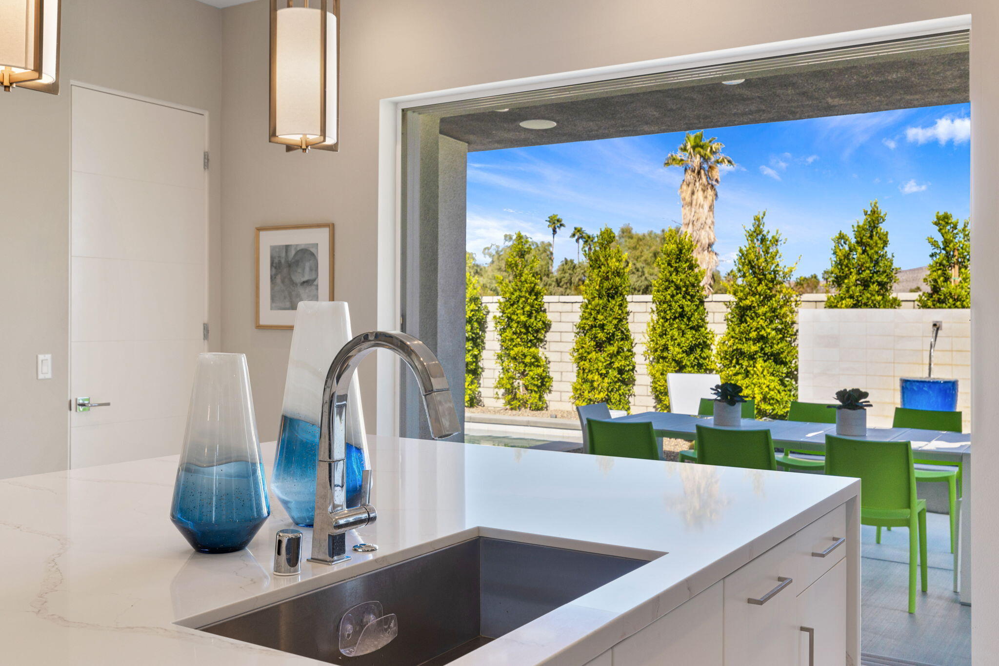 2 Iridium Way Rancho Mirage, CA 92270 - Photo 34 of 67 a kitchen with a sink and a large window