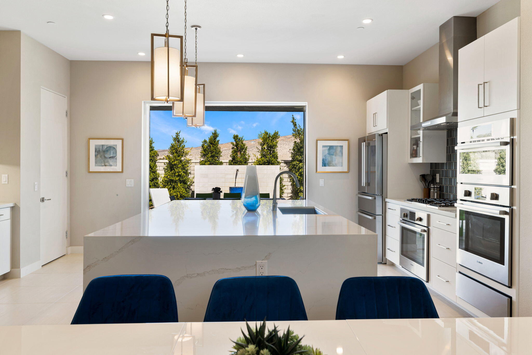 2 Iridium Way Rancho Mirage, CA 92270 - Photo 43 of 67 a view of kitchen with stainless steel appliances refrigerator stove microwave and cabinets