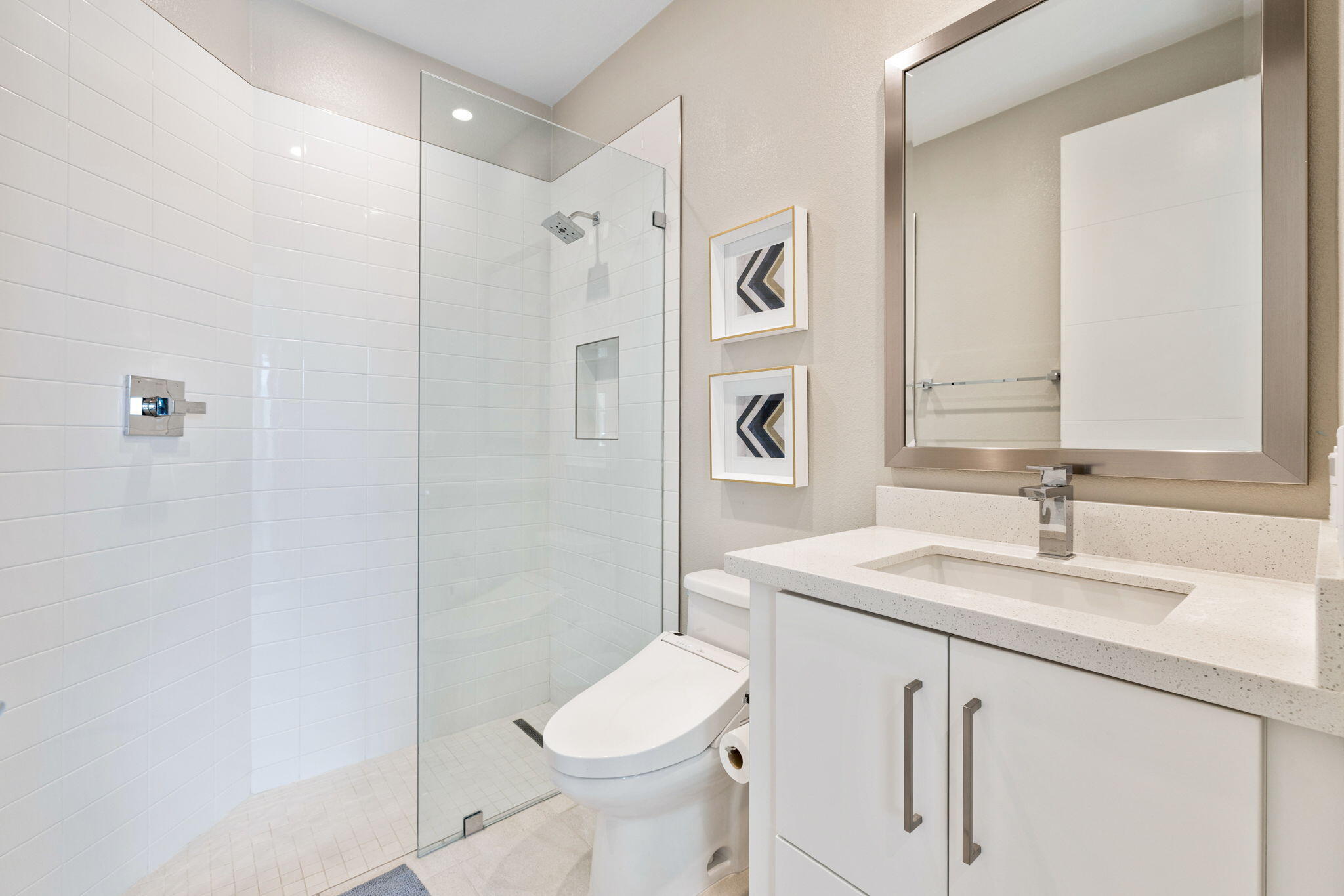 2 Iridium Way Rancho Mirage, CA 92270 - Photo 9 of 67 a bathroom with a sink toilet vanity and shower