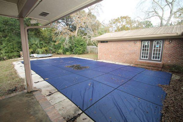 6047 Eden Square Crestview, FL 32539 - Photo 29 of 39 a view of a backyard with furniture and garden