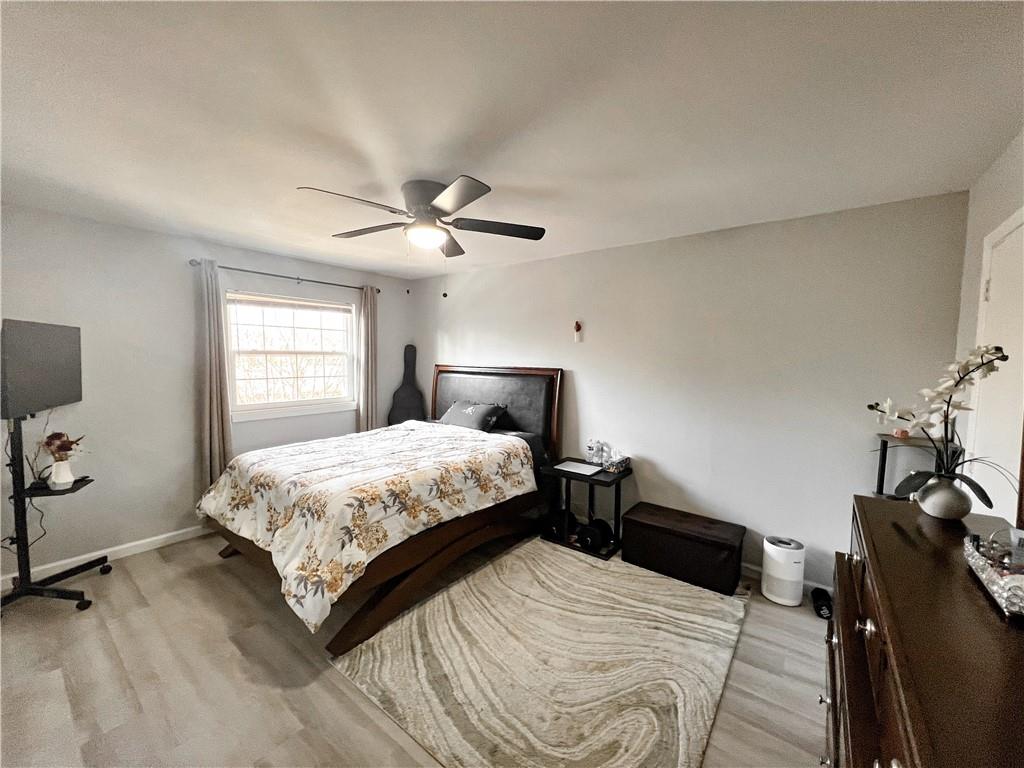 3549 Old Chamblee Tucker Road, Unit J Atlanta, GA 30340 - Photo 11 of 61 a bedroom with a bed and window