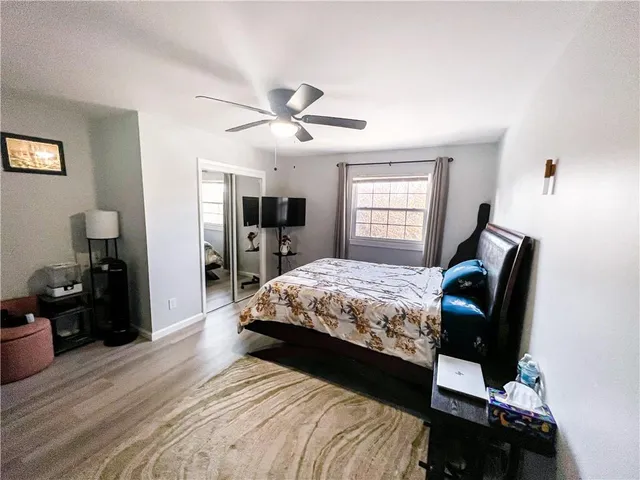 a bathroom with a bathtub and toilet