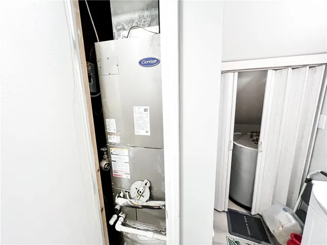 a kitchen with a stove and a microwave