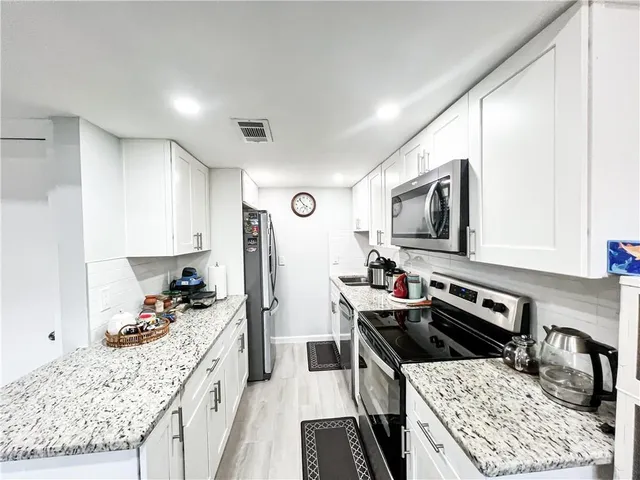 a view of a dining room with furniture