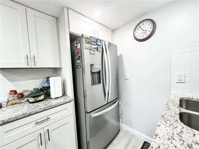 a view of a workspace with furniture