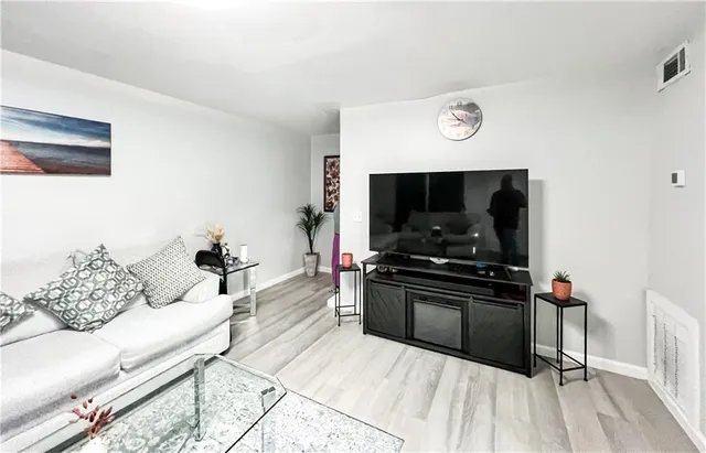 a bedroom with a bed and a table