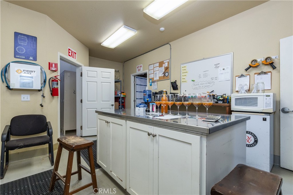 2720 Oak View Road Templeton, CA 93465 - Photo 46 of 75 Central Work Island with Built-In Storage