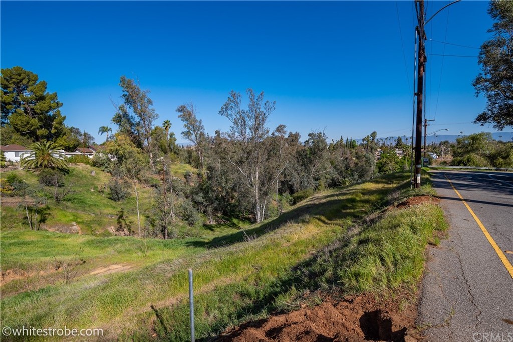 5023 Myrtle Riverside, CA 92506 - Photo 7 of 14 a view of a lake with a yard