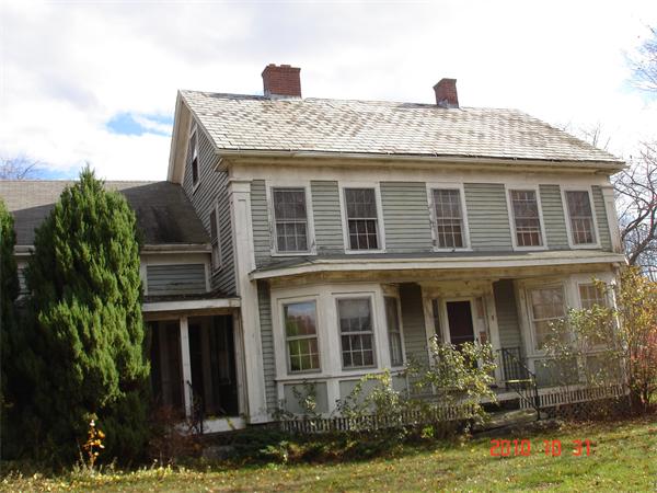 1 Walker Road Ware, MA 01082 - Photo 1 of 1 a view of a house with potted plants and a yard