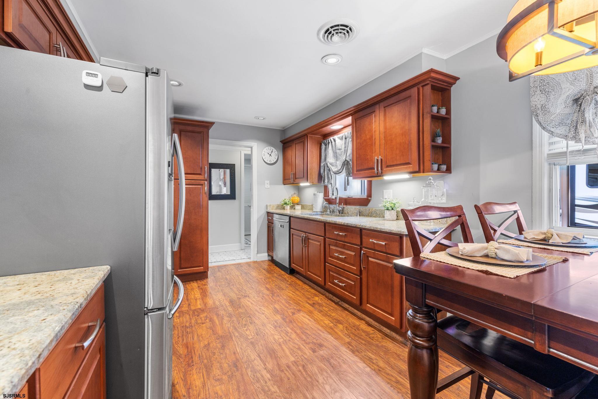 210 Mill Road Absecon, NJ 08201 - Photo 11 of 52 a kitchen with a stove a refrigerator and a stove