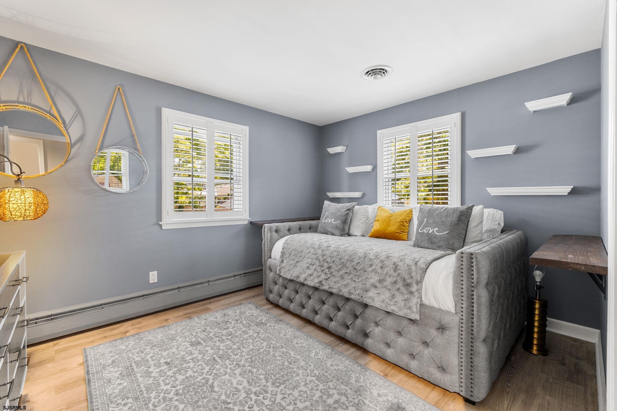 210 Mill Road Absecon, NJ 08201 - Photo 20 of 52 a bedroom with a bed and a window