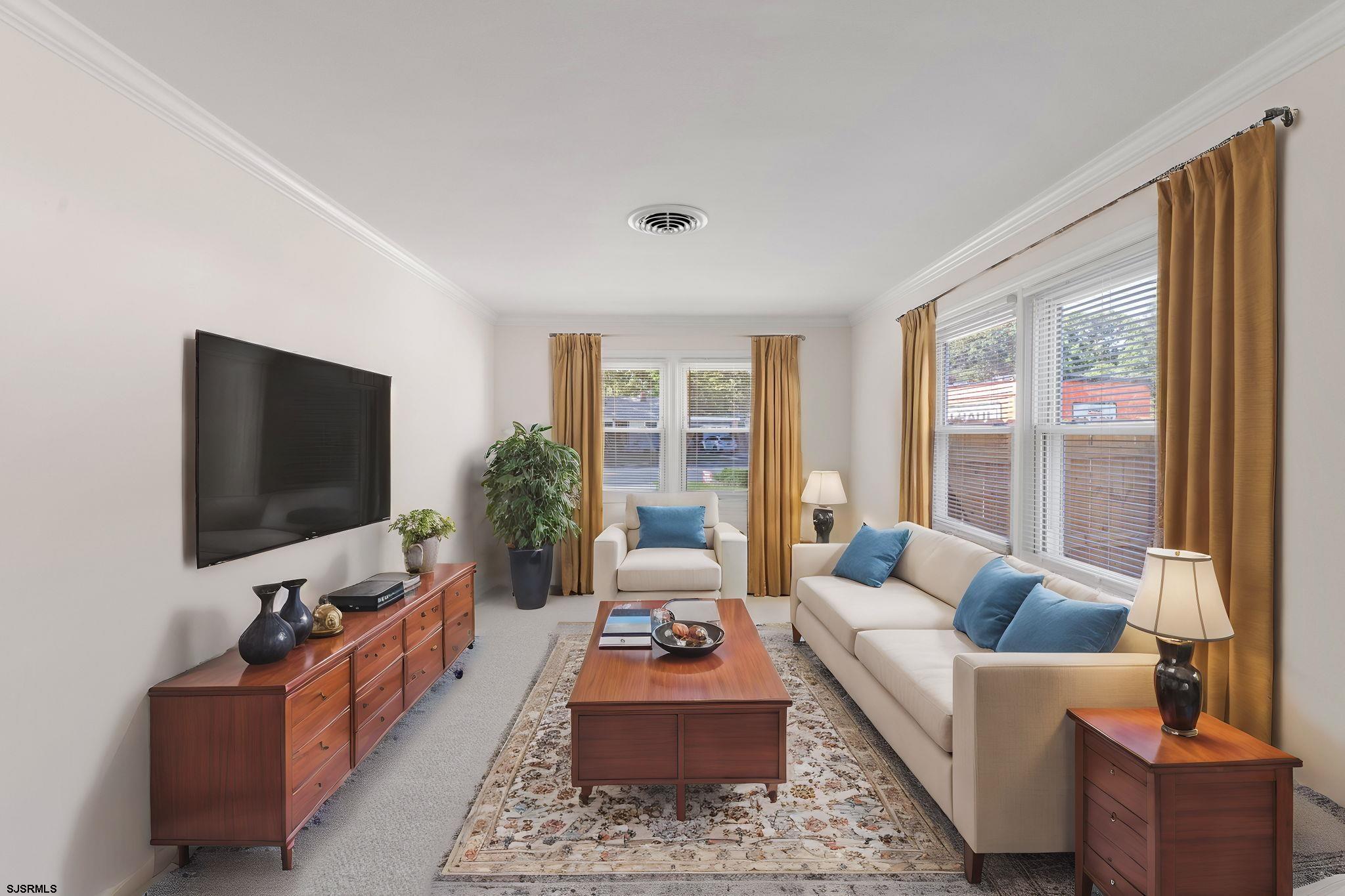 210 Mill Road Absecon, NJ 08201 - Photo 24 of 52 a living room with furniture and a flat screen tv