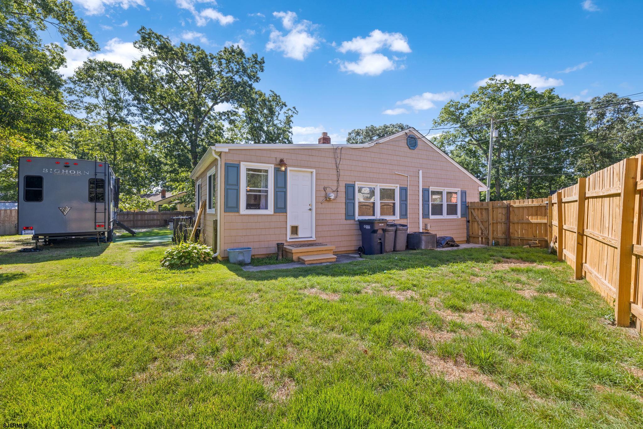 210 Mill Road Absecon, NJ 08201 - Photo 35 of 52 a view of a house with backyard and sitting area