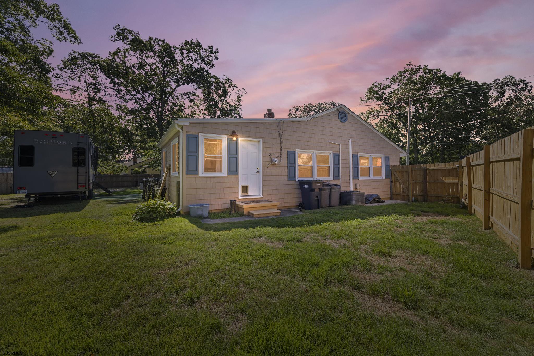 210 Mill Road Absecon, NJ 08201 - Photo 39 of 52 a front view of a house with a garden