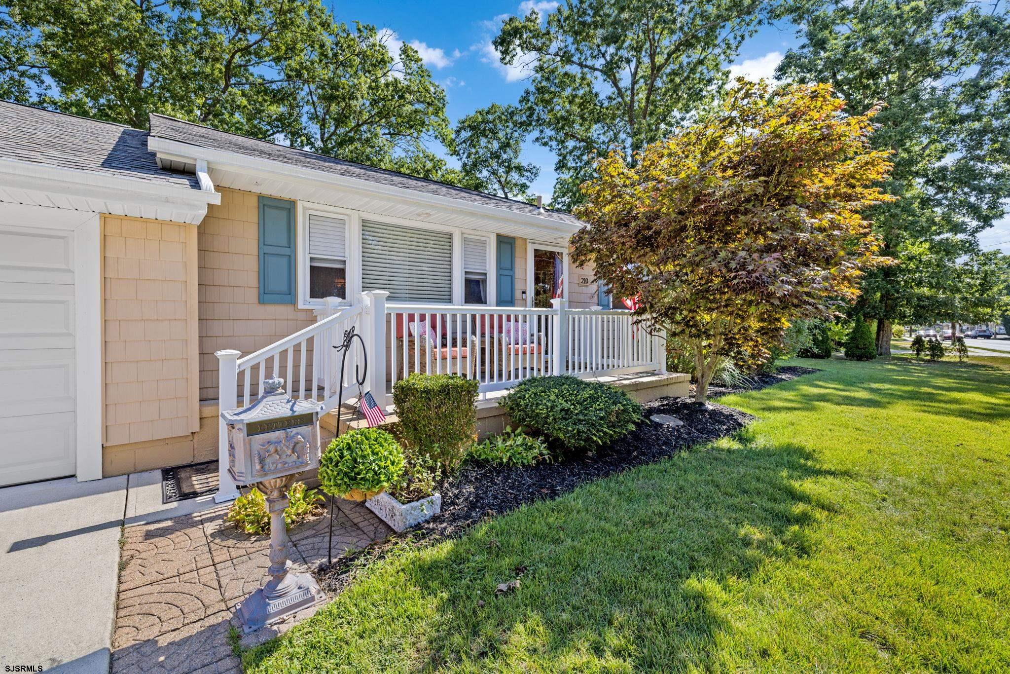 210 Mill Road Absecon, NJ 08201 - Photo 4 of 52 a view of a house with a yard and garden