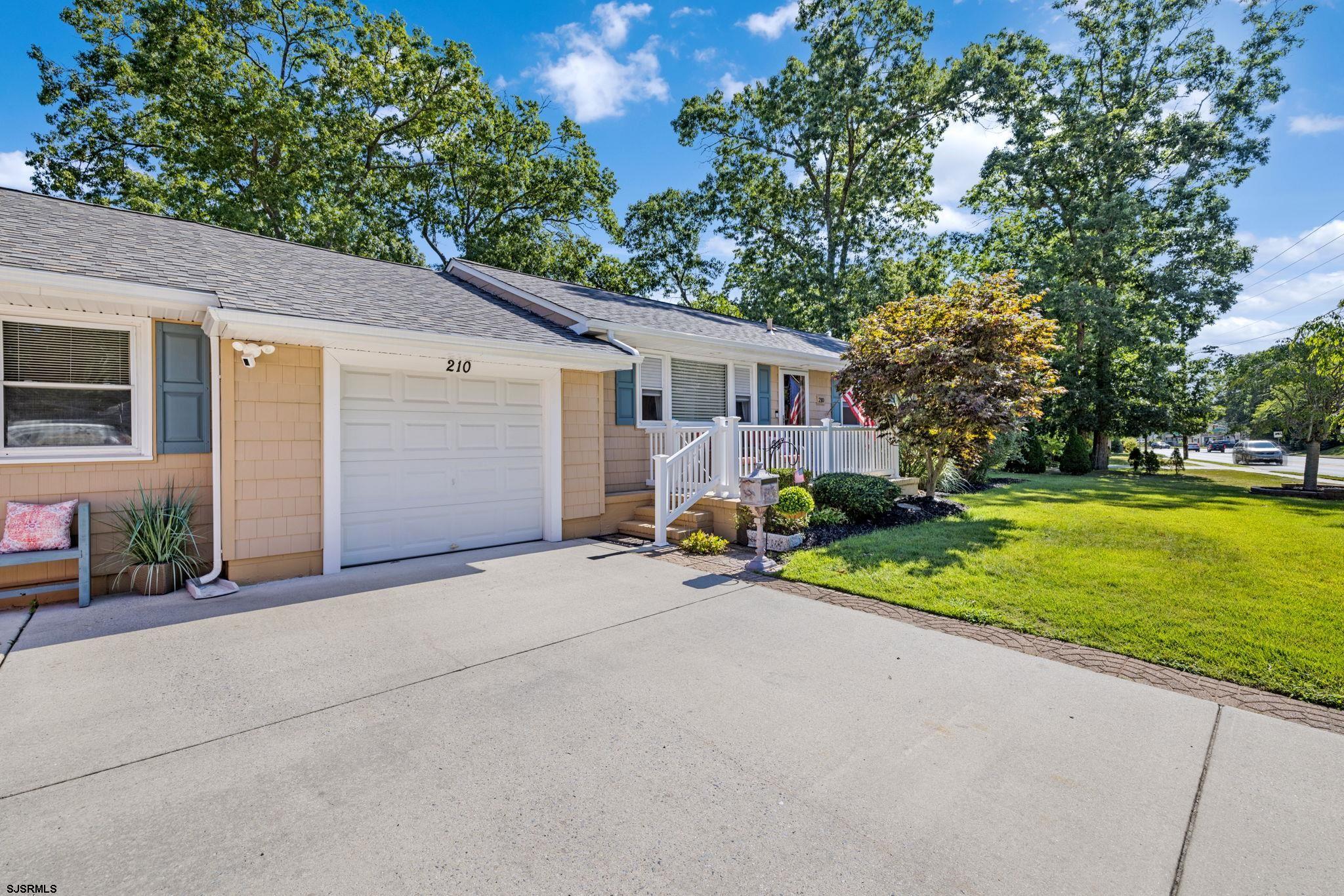 210 Mill Road Absecon, NJ 08201 - Photo 41 of 52 a view of a house with backyard and a tree