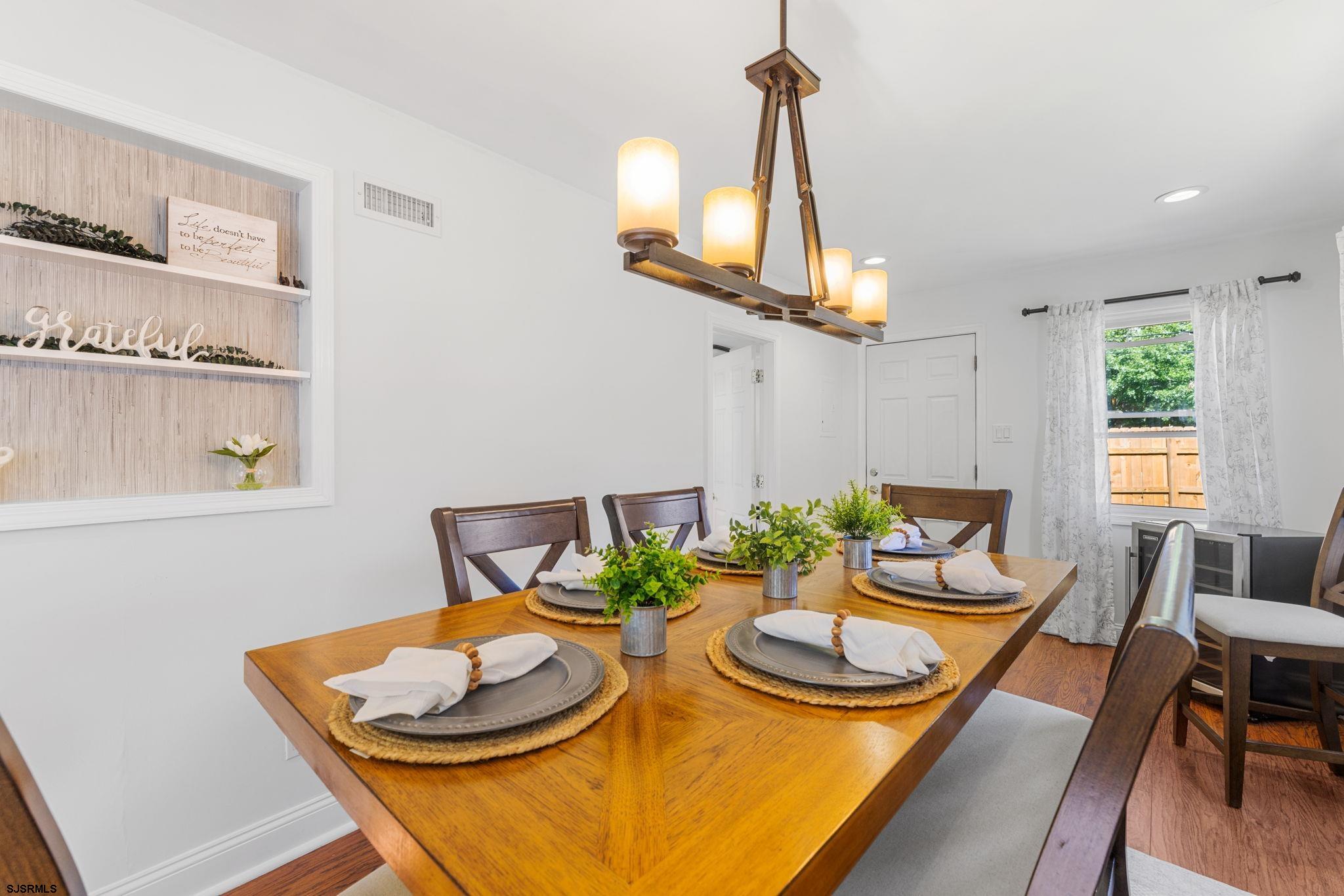 210 Mill Road Absecon, NJ 08201 - Photo 52 of 52 a dining room with furniture and window