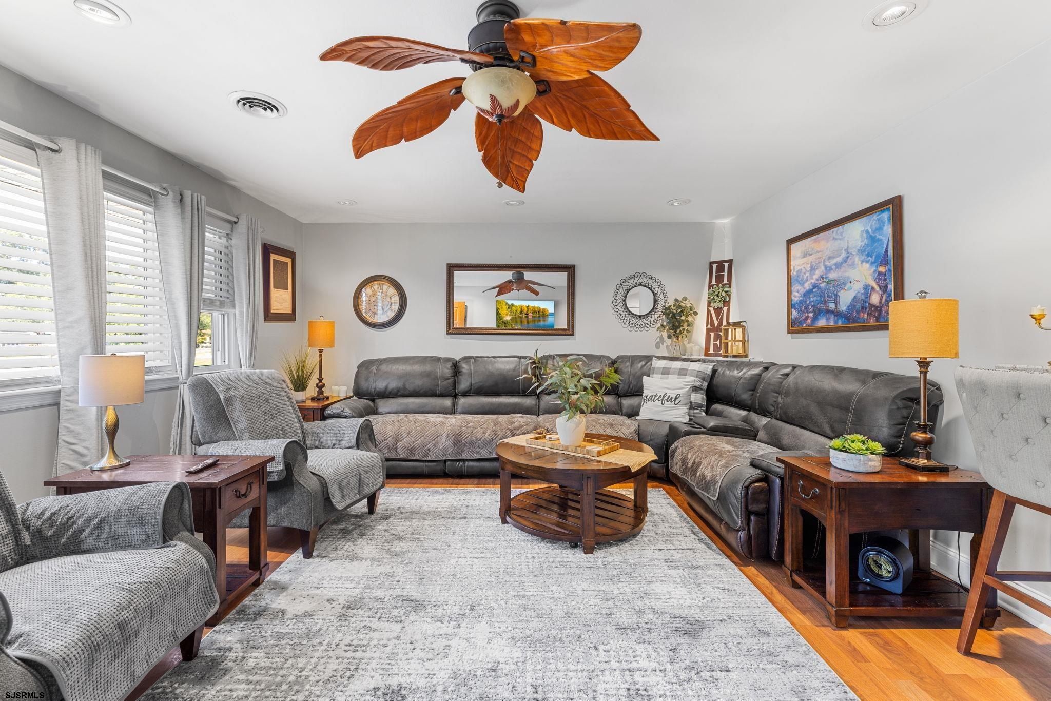210 Mill Road Absecon, NJ 08201 - Photo 6 of 52 a living room with furniture and a large window