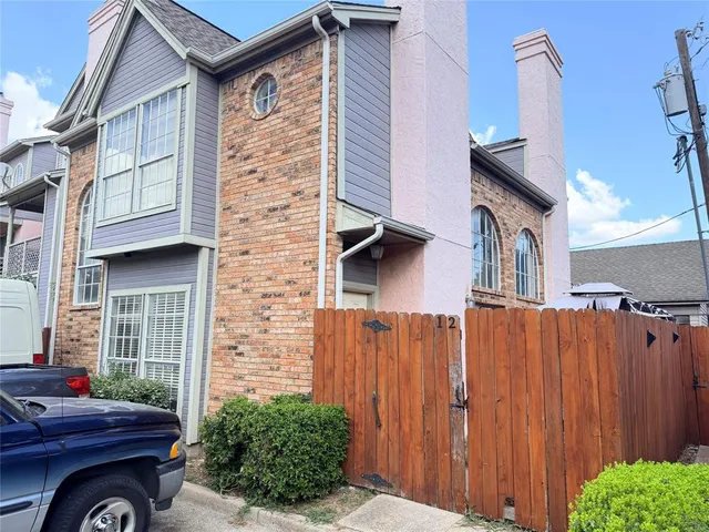 a backyard of a house with seating space