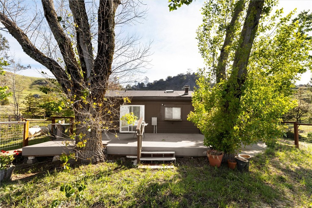 3510 Cypress Mountain Road Templeton, CA 93465 - Photo 41 of 44 a front view of a house with a garden and trees