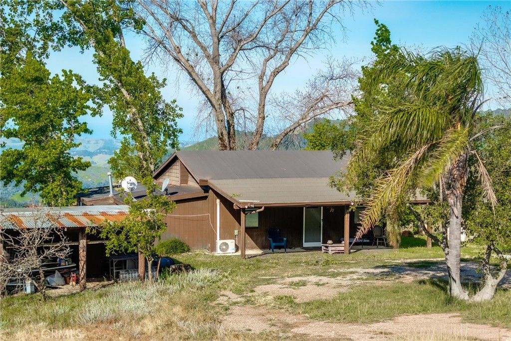 3510 Cypress Mountain Road Templeton, CA 93465 - Photo 7 of 44 a view of a house with a yard