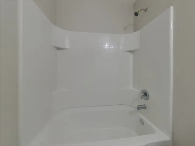 a close up of a bathtub