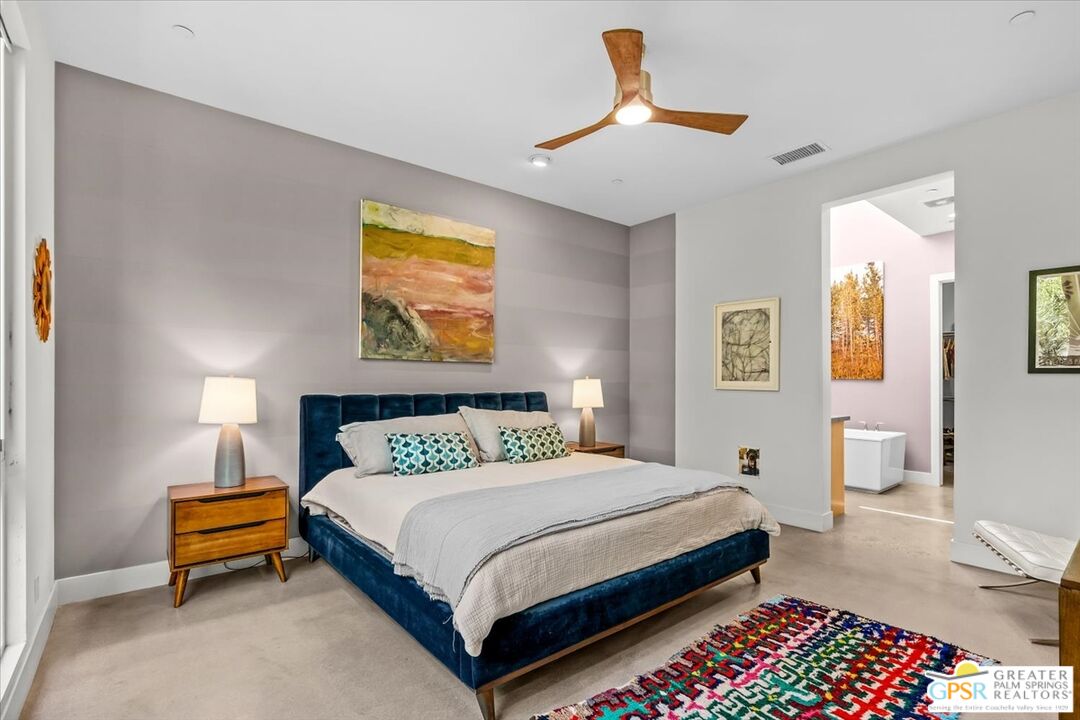 4201 Amber Lane Palm Springs, CA 92262 - Photo 14 of 55 a bedroom with a bed and painting on the wall