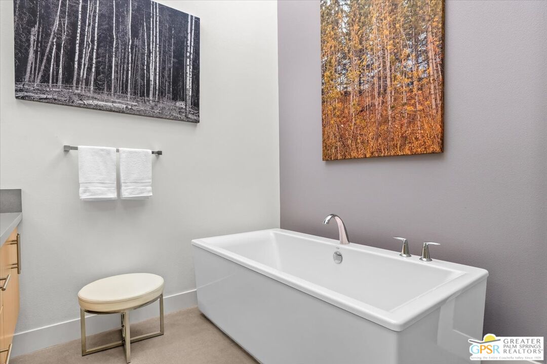 4201 Amber Lane Palm Springs, CA 92262 - Photo 18 of 55 a bathroom with a toilet a sink and mirror