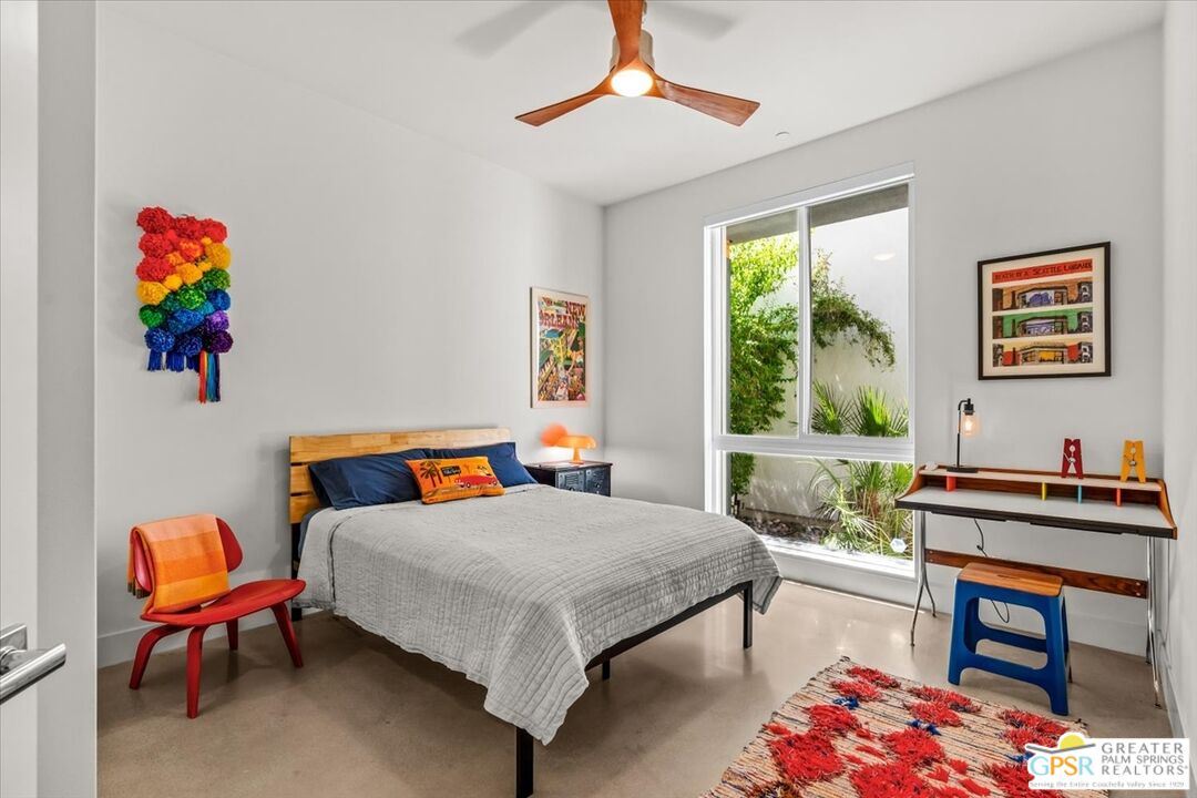 4201 Amber Lane Palm Springs, CA 92262 - Photo 27 of 55 a bedroom with furniture and a potted plant