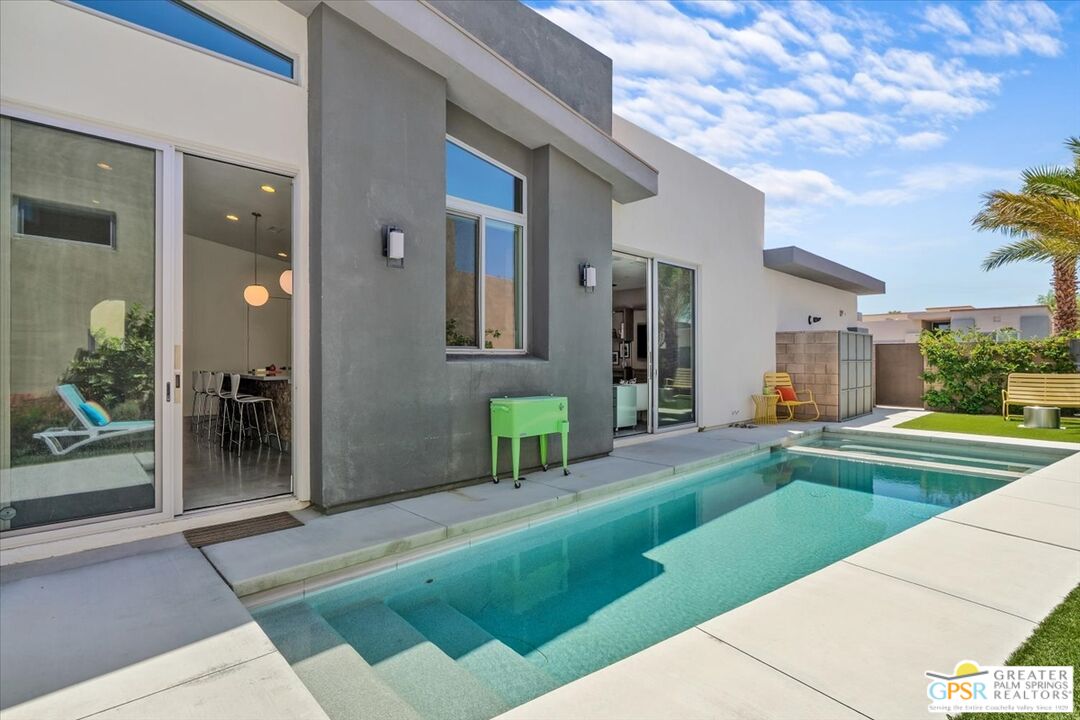 4201 Amber Lane Palm Springs, CA 92262 - Photo 36 of 55 a front view of a house with garden