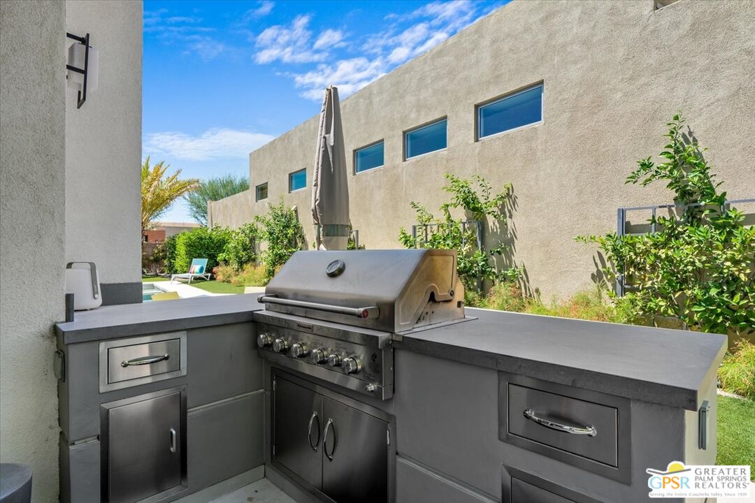 4201 Amber Lane Palm Springs, CA 92262 - Photo 45 of 55 a view of an outdoor kitchen with a sink