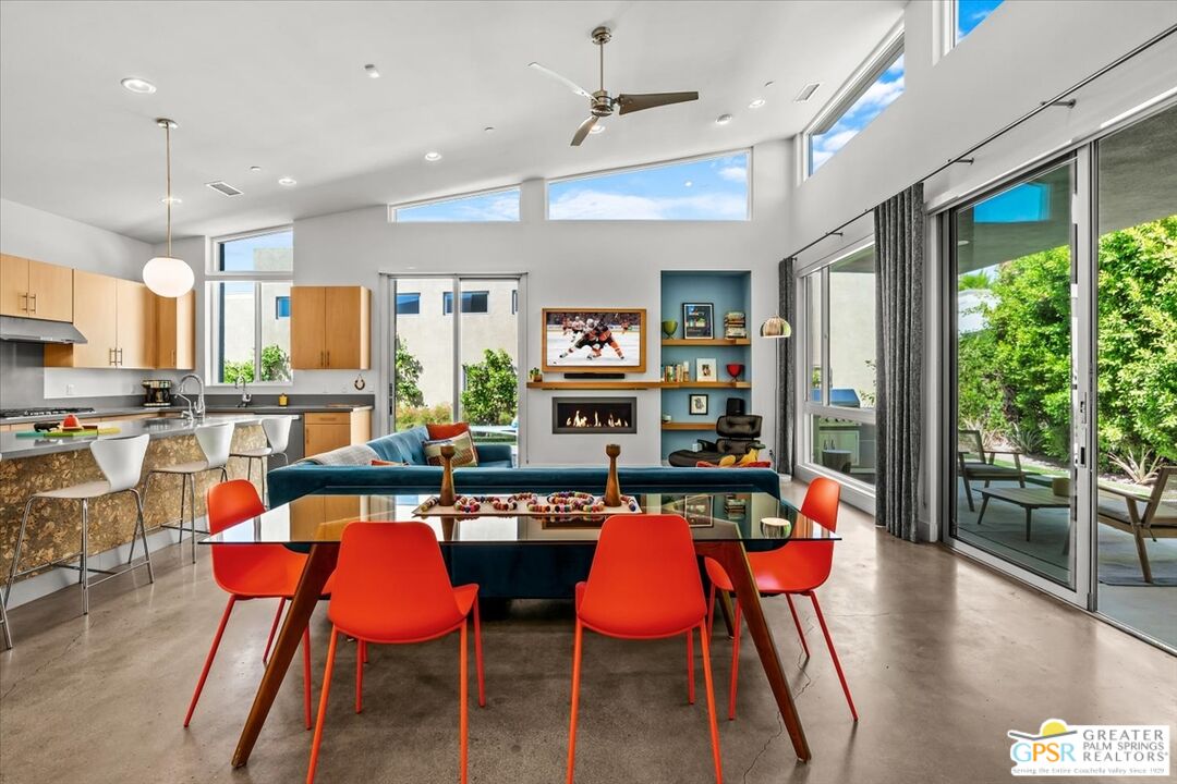 4201 Amber Lane Palm Springs, CA 92262 - Photo 8 of 55 a view of a dining room with furniture window and wooden floor