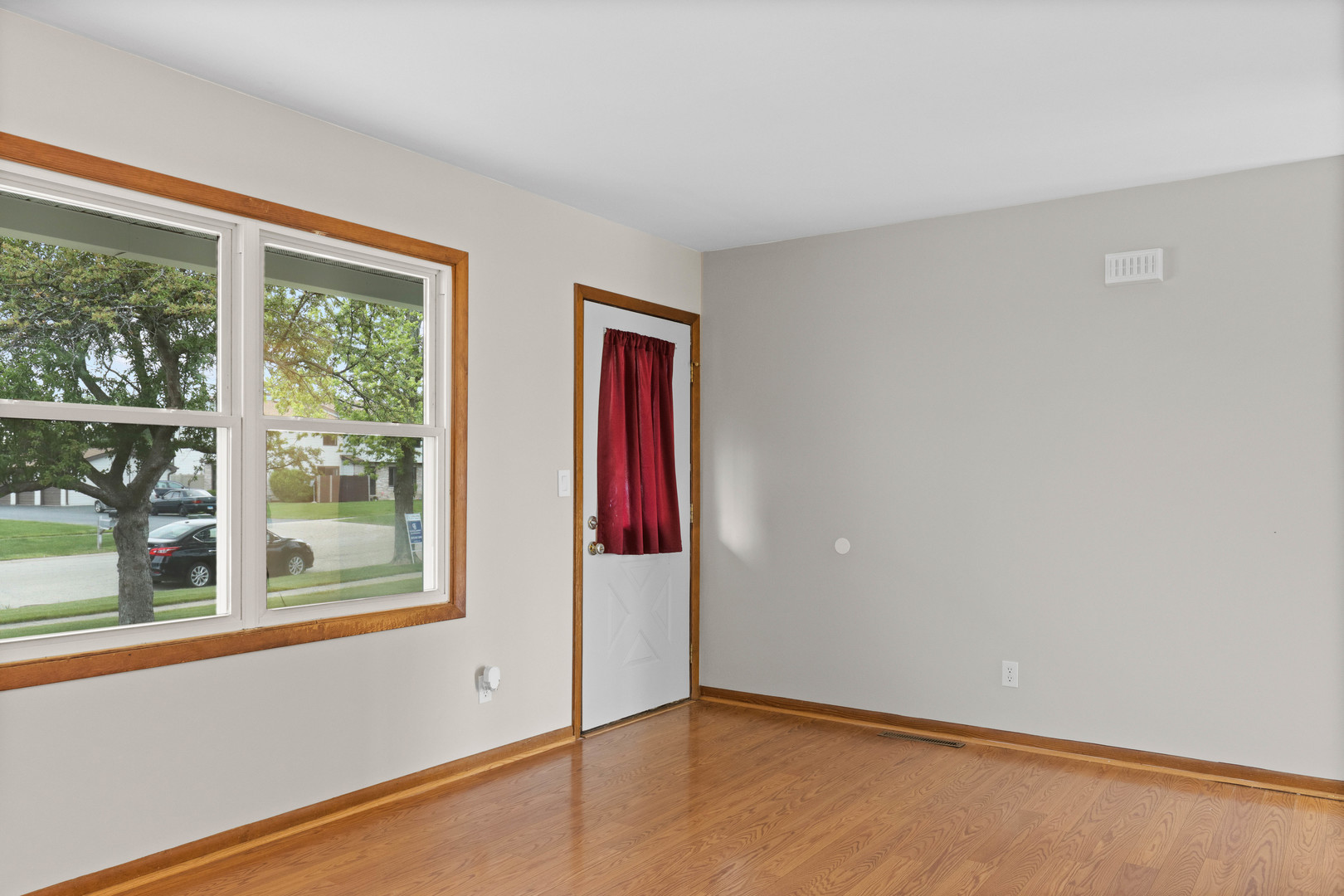 1010 Southgate Road New Lenox, IL 60451 - Photo 9 of 30 an empty room with wooden floor and windows
