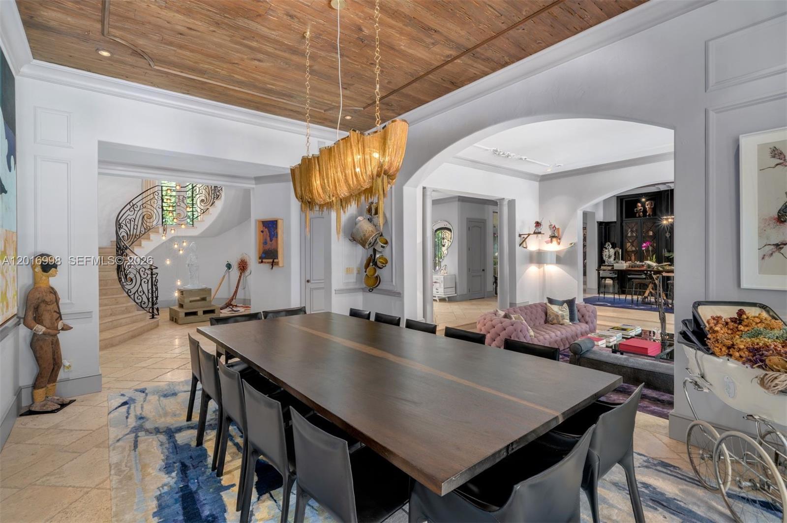 4790 Southwest 78th Street Miami, FL 33143 - Photo 18 of 33 a view of a dining room with furniture and wooden floor
