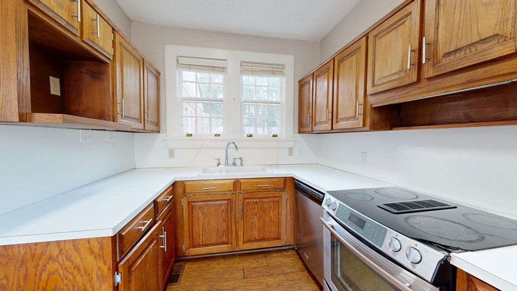 1237 Peacock Avenue Columbus, GA 31906 - Photo 12 of 52 a kitchen with a sink cabinets and window