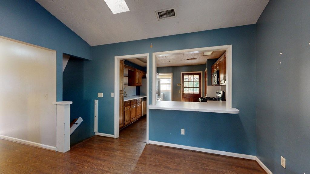 1237 Peacock Avenue Columbus, GA 31906 - Photo 29 of 52 hallway view with wooden floor and windows