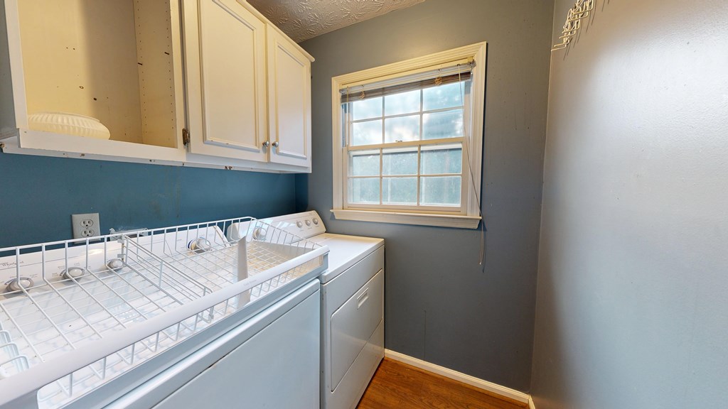 1237 Peacock Avenue Columbus, GA 31906 - Photo 35 of 52 a bath tub sitting next to a window