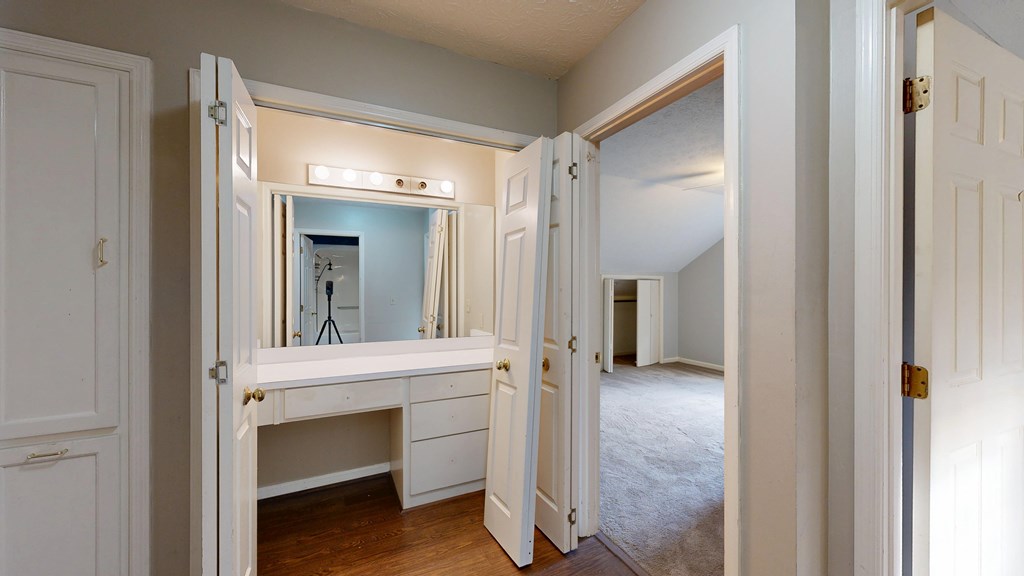1237 Peacock Avenue Columbus, GA 31906 - Photo 39 of 52 a view of a hallway with wooden floor and cabinet
