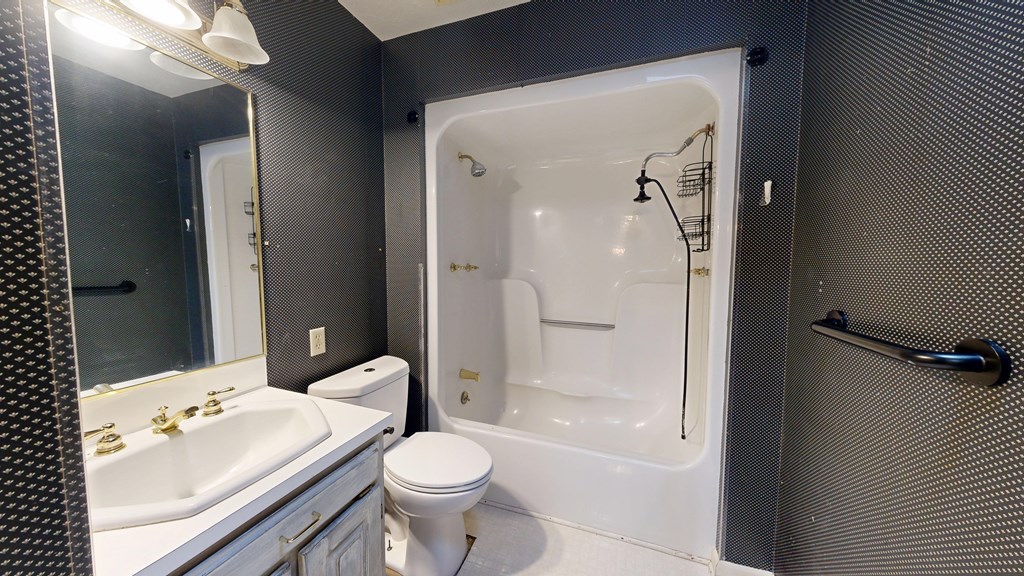 1237 Peacock Avenue Columbus, GA 31906 - Photo 40 of 52 a bathroom with a sink a toilet and shower