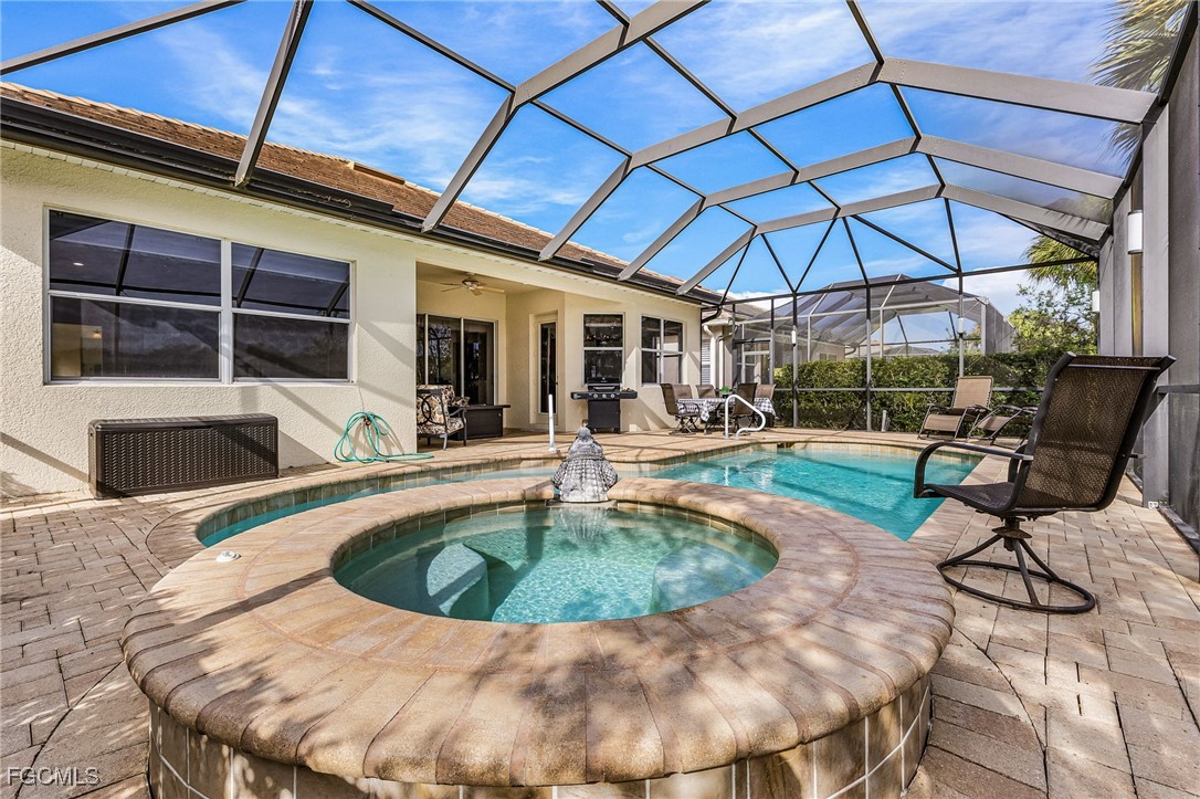 3900 Lakeview Isle Court Fort Myers, FL 33905 - Photo 13 of 31 a view of a backyard with swimming pool