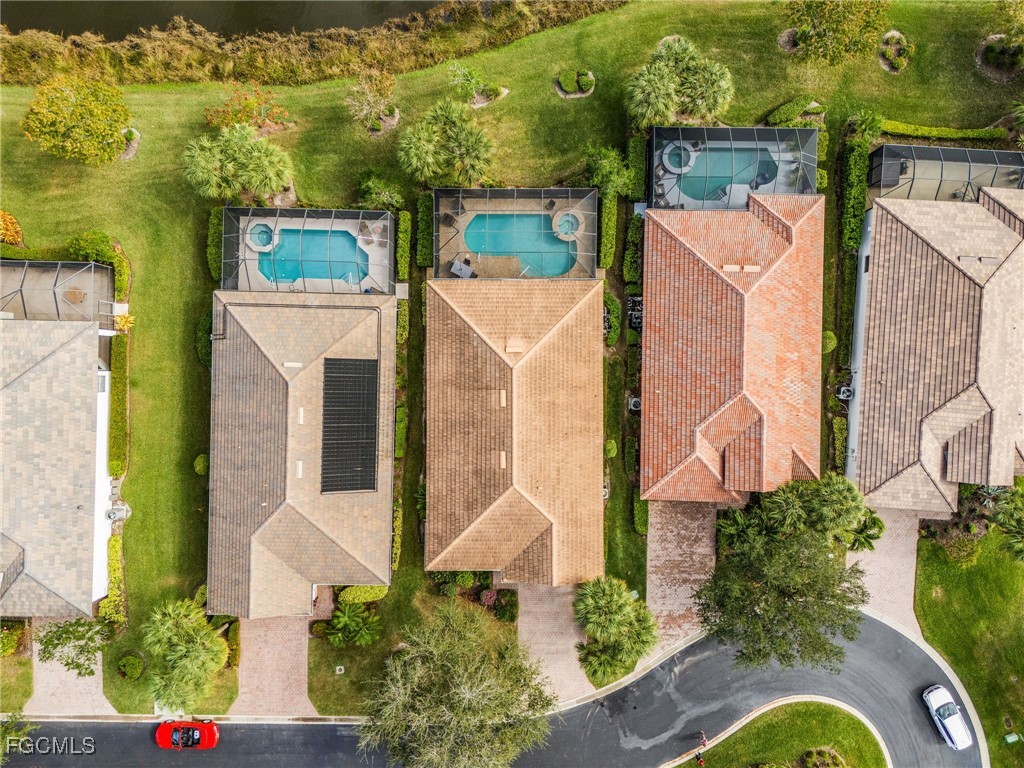 3900 Lakeview Isle Court Fort Myers, FL 33905 - Photo 24 of 31 an aerial view of a house with swimming pool and porch