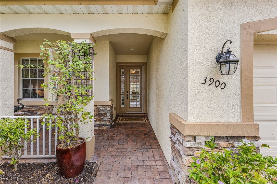 3900 Lakeview Isle Court Fort Myers, FL 33905 - Photo 4 of 31 a view of a entryway door of the house