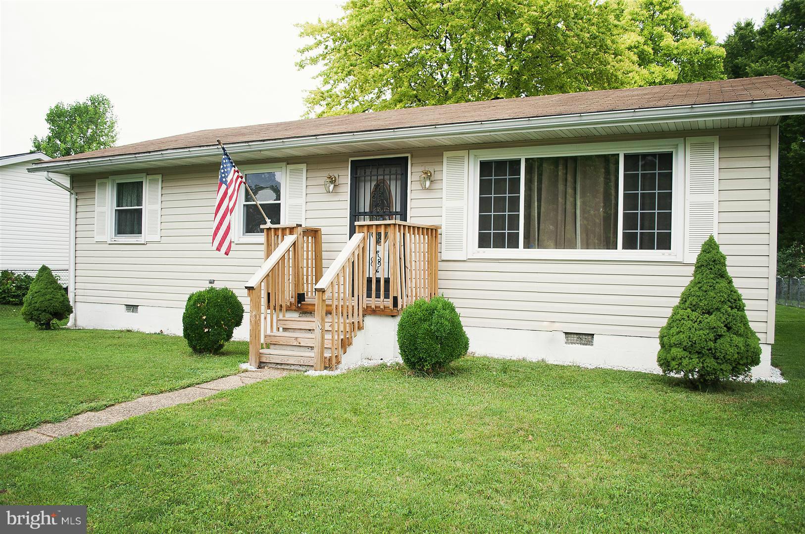 100 Valley Branch Drive Ranson, WV 25438 - Photo 3 of 8 a front view of a house with garden