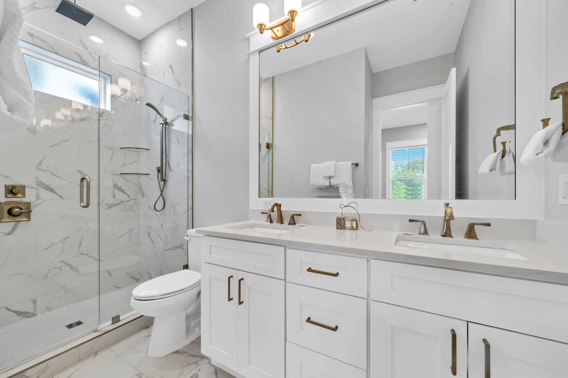 50 West Blue Crab Loop Inlet Beach, FL 32461 - Photo 13 of 67 a bathroom with a double vanity sink toilet mirror and shower