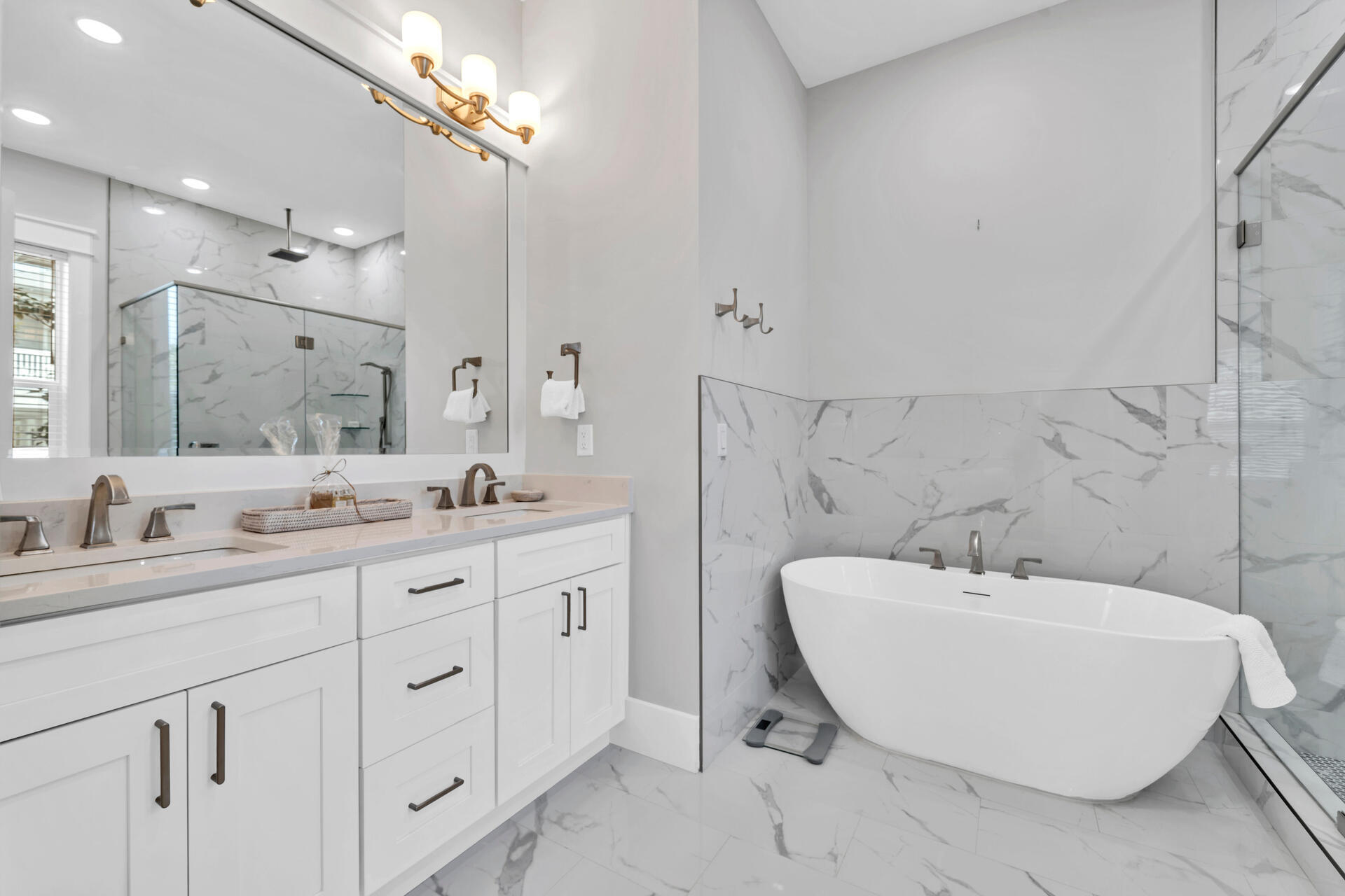 50 West Blue Crab Loop Inlet Beach, FL 32461 - Photo 17 of 67 a bathroom with a double vanity sink a mirror and a bathtub