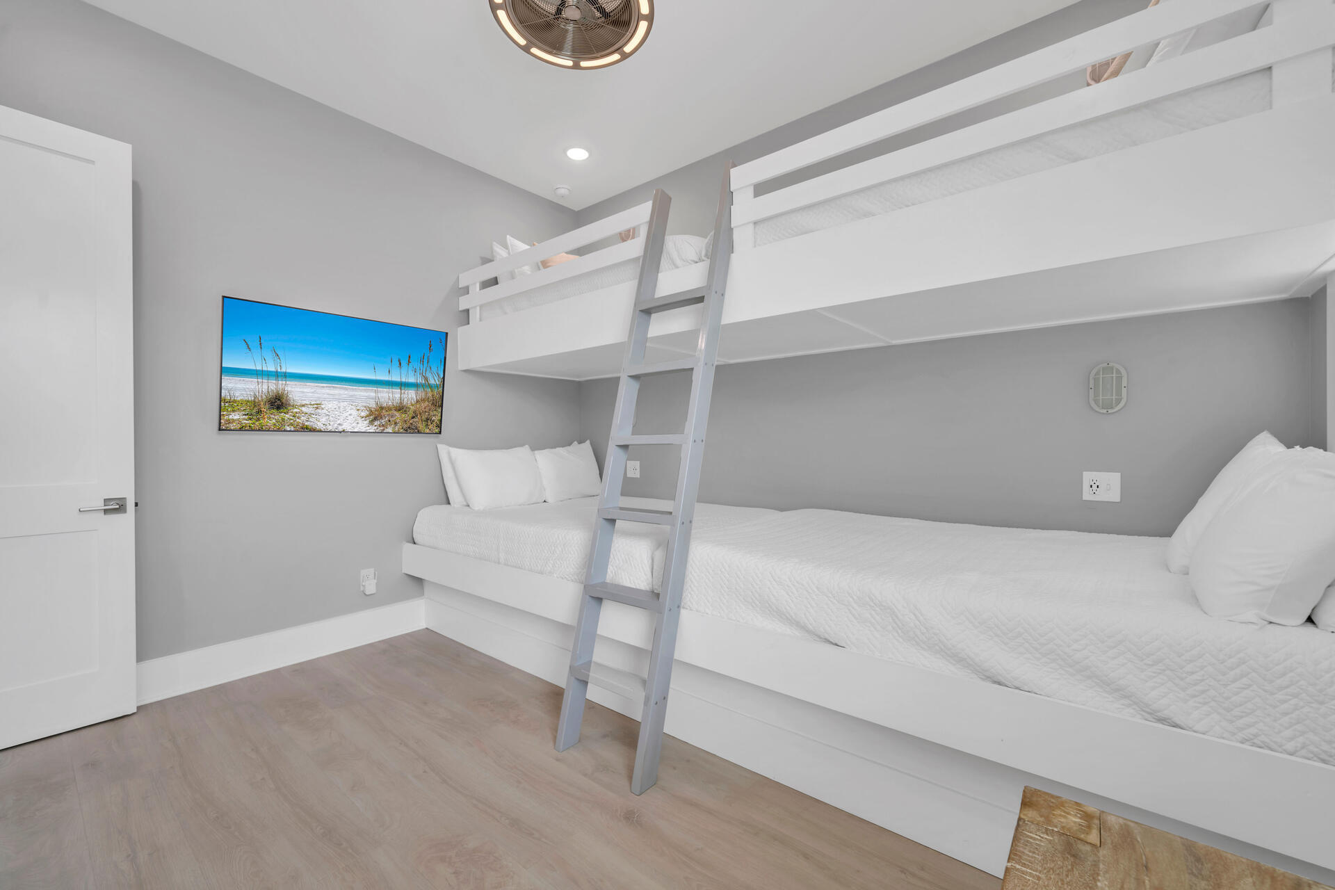 50 West Blue Crab Loop Inlet Beach, FL 32461 - Photo 32 of 67 a bedroom with a bed and a ceiling fan