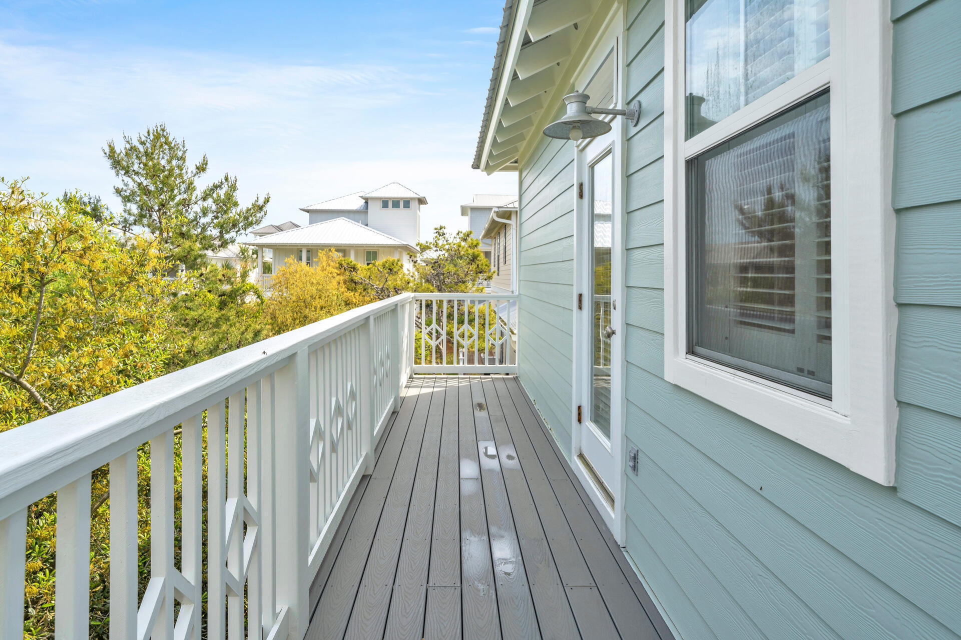50 West Blue Crab Loop Inlet Beach, FL 32461 - Photo 47 of 67 a view of a balcony with wooden floor and fence