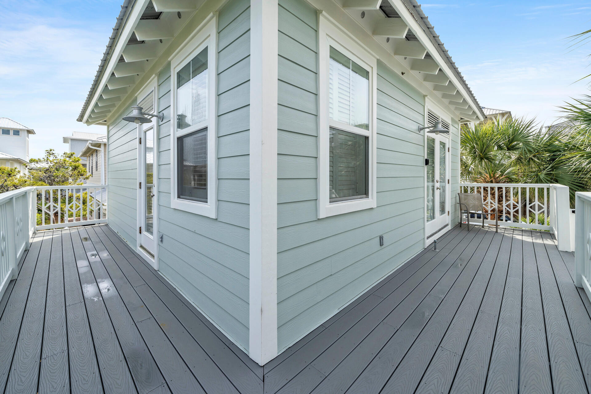 50 West Blue Crab Loop Inlet Beach, FL 32461 - Photo 48 of 67 a view of a wooden deck with a yard