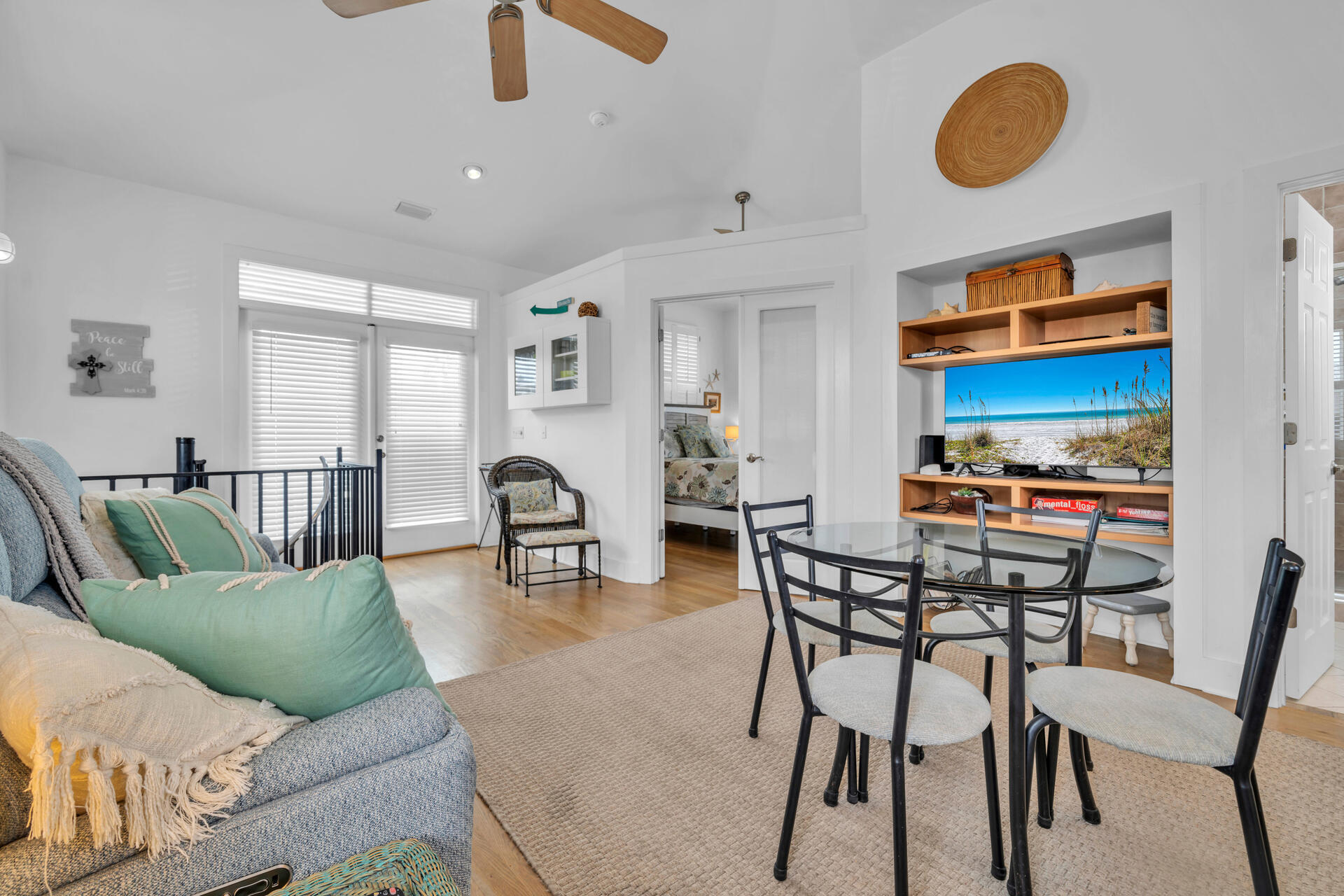 50 West Blue Crab Loop Inlet Beach, FL 32461 - Photo 51 of 67 a view of a dining room with furniture and a rug