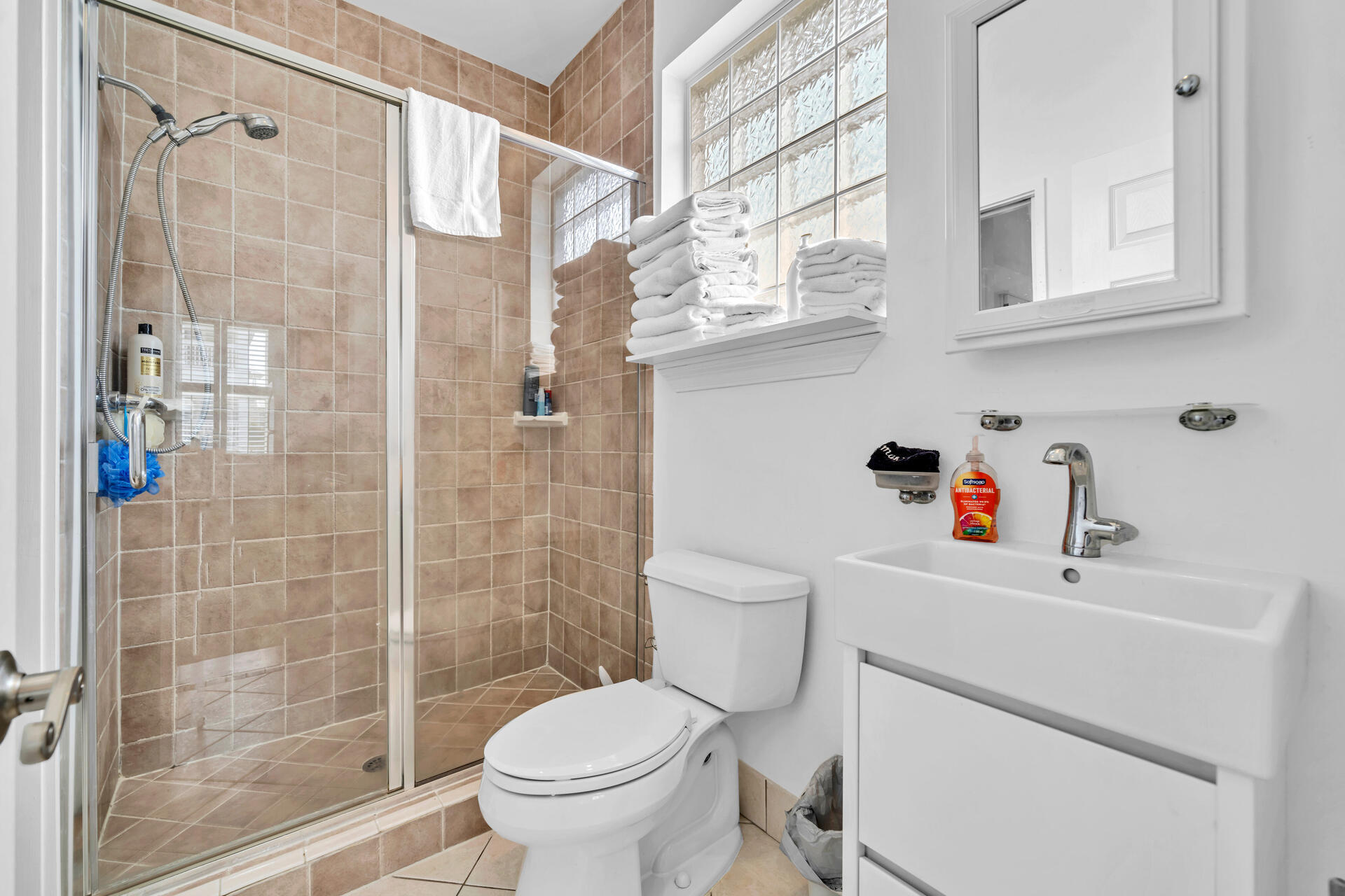 50 West Blue Crab Loop Inlet Beach, FL 32461 - Photo 53 of 67 a white toilet sitting next to a bathroom sink
